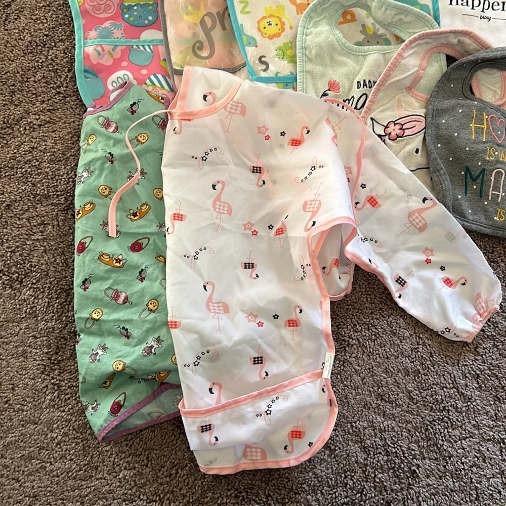 Babygirl cloth and plastic bib bundle!